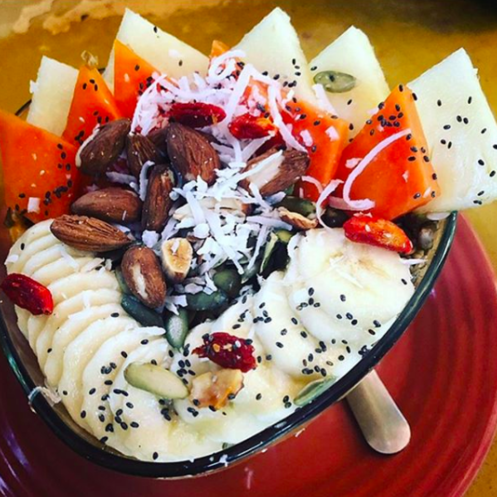 vegan white and red smoothie bowl with banana and chia seeds at Raw Love Tulum in Tulum Mexico
