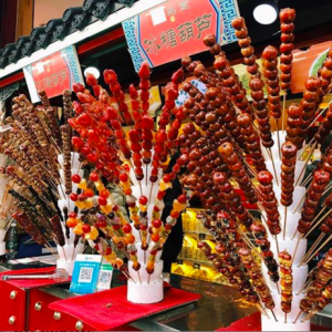 Candied hawthorne or tanghulu in a Guilin street food market