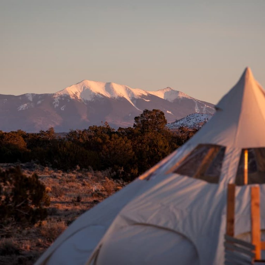 Yurt with snow capped Grand Canyon mountain views