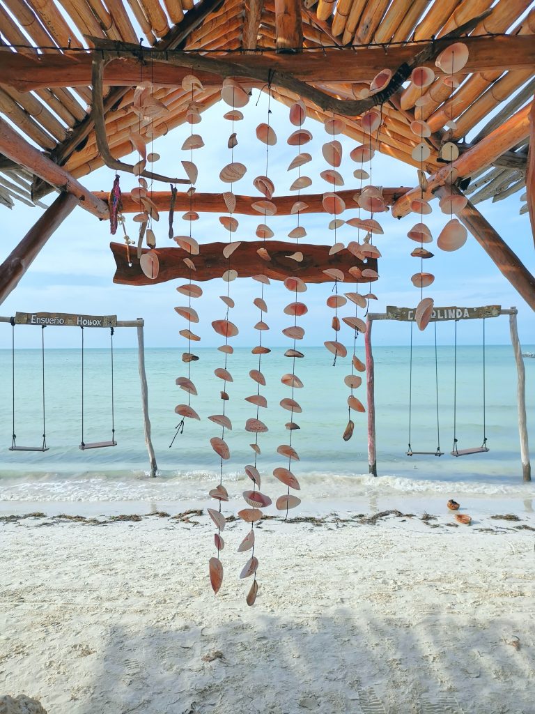 Seashells hang from a beach club on Isla Holbox